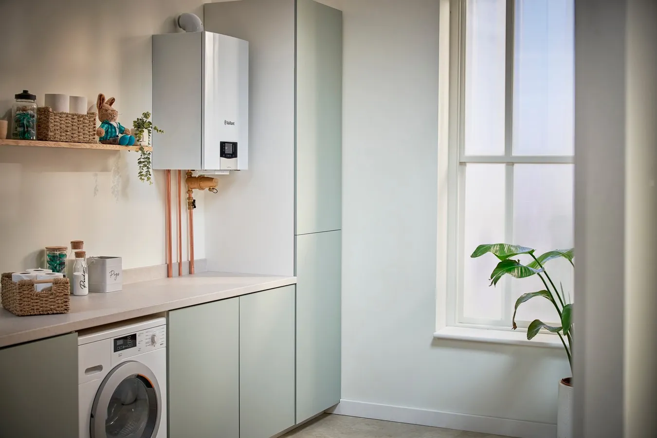 A laundry room with a washer and dryer.