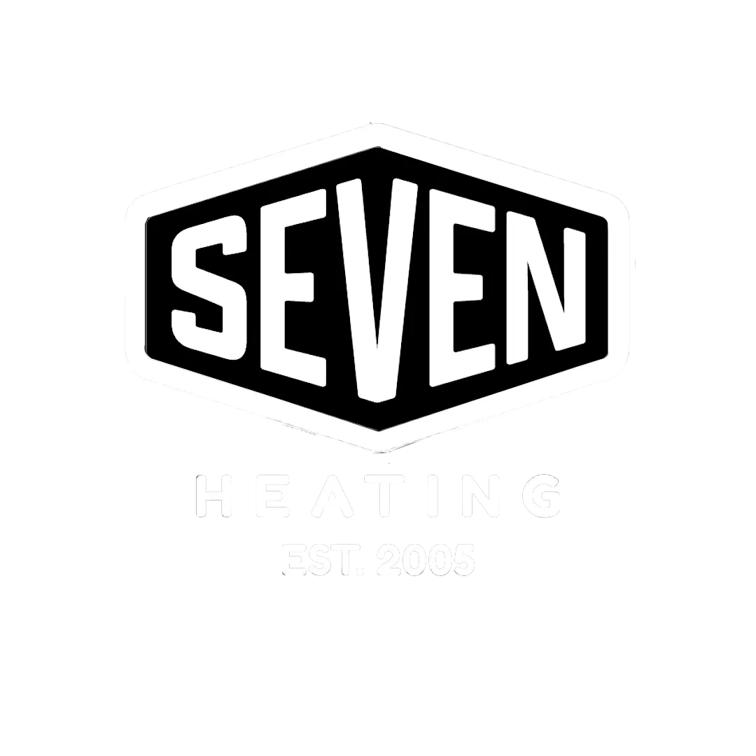A black and white photo of the seven logo.